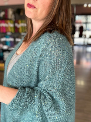 handknit boxy cardigan closeup on shoulder