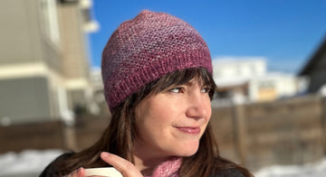 woman wearing an alpaca-silk blend handknit accessory set