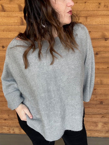 closeup image of the fabric of a handknit poncho