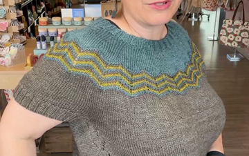 closeup image of the fabric of a handknit top