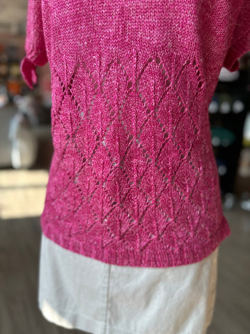 close up of lace knit fabric on summer tee