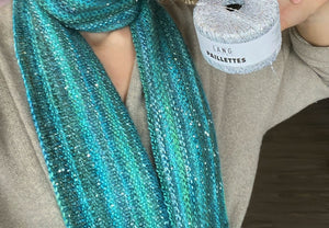 closeup image of multicolor textured and sequined handknit scarf