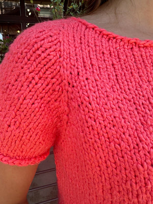 closeup image of the fabric of a handknit top
