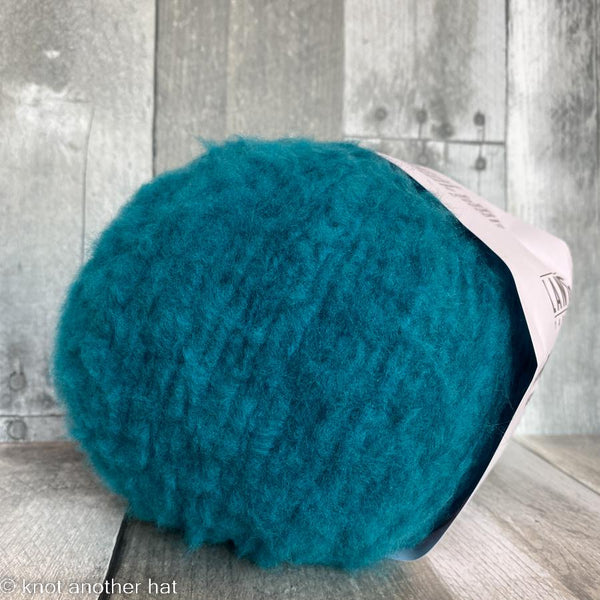 lang phoenix 79 turquoise - Knot Another Hat