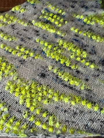 knit shawl with planned pooling technique