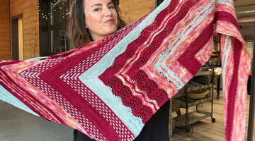 striped patterned shawl displayed lengthwise