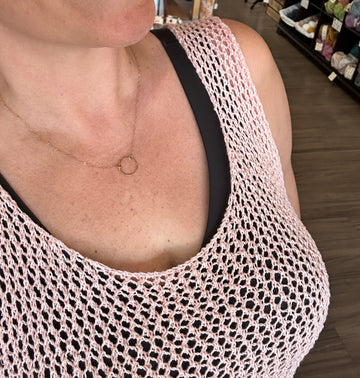 closeup image of the fabric of a handknit tank top
