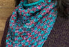 closeup image of the fabric of a 2-color handknit cowl