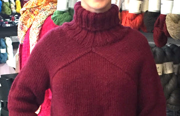 pullover sweater modeled by a woman