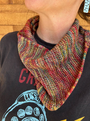 closeup image of the fabric of a handknit scarf