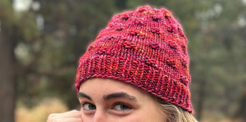 closeup image of the textured fabric of handknit accessories