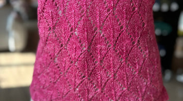close up of lace knit fabric on summer tee