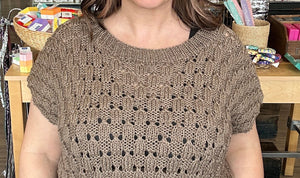 closeup image of the fabric of a handknit top