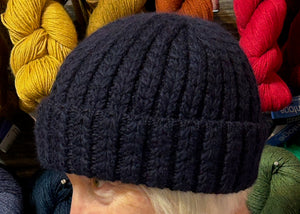 closeup image of the fabric of a textured handknit hat