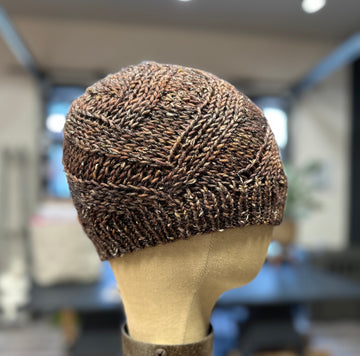 closeup image of a textured handknit hat