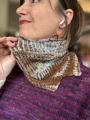 closeup image of the fabric of a brioche rib textured handknit cowl