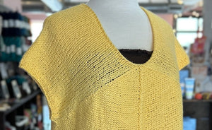 closeup image of the fabric of a cotton handknit top