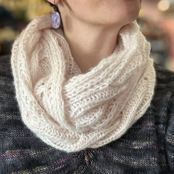 closeup image of a luxurious cashmere-silk cabled handknit scarf