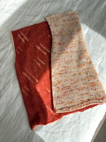 closeup image of the front and back fabric of a reversible handknit top