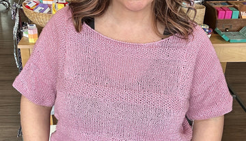 closeup image of the fabric of a handknit top