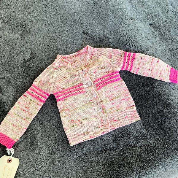 one of a kind handknit sample party of pink baby cardigan Knot